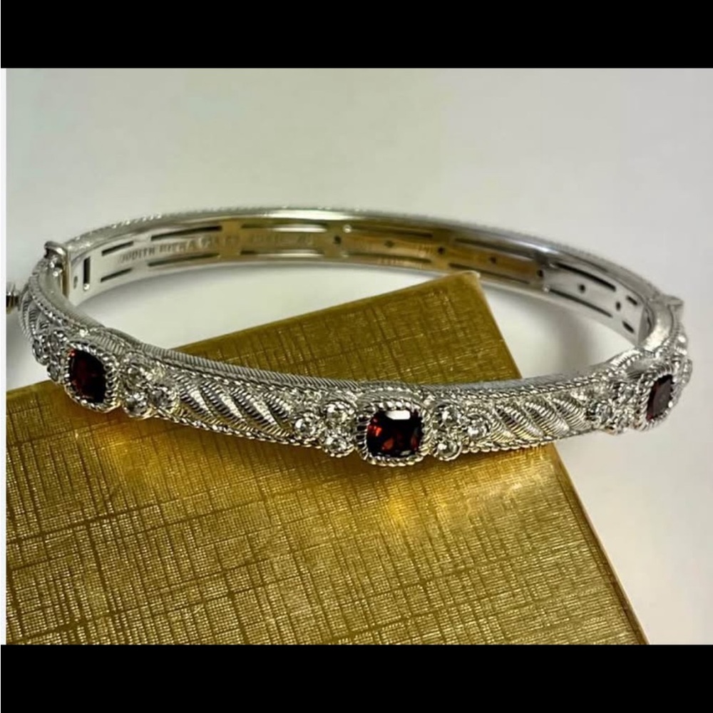 Rare, unique and elegant Judith Ripka Sterling Silver garnet hinged bracelet.